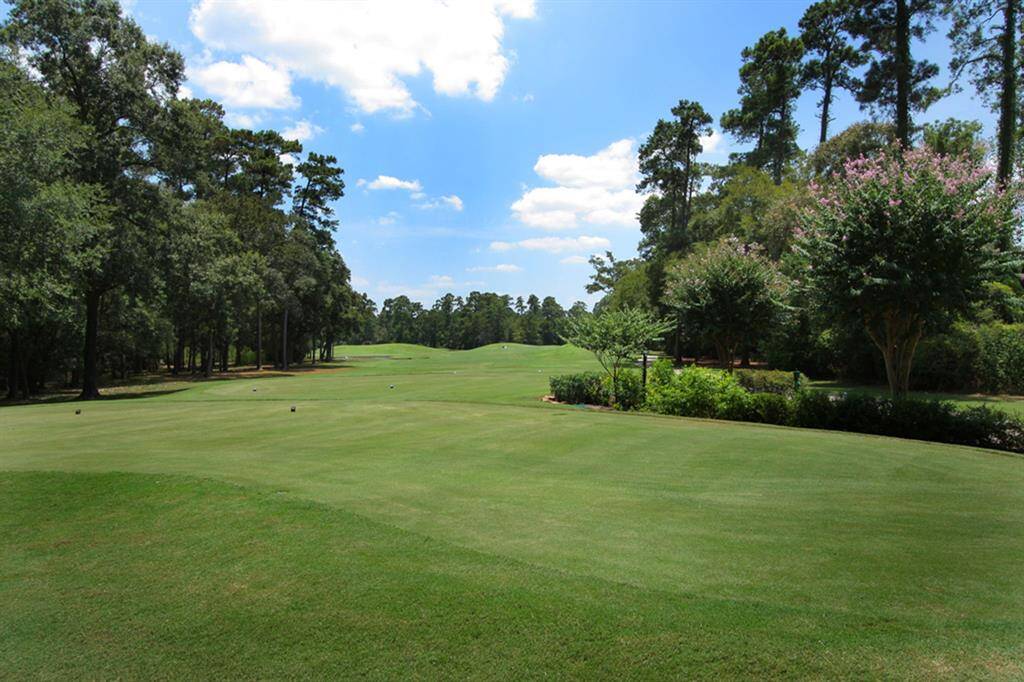 Lush, tree-lined fairways wind through The Woodlands, Texas, home to premier golf courses like The Woodlands Country Club, Carlton Woods, and The Woodlands Resort. Championship greens, serene water features, and signature designs by legends like Jack Nicklaus and Arnold Palmer create a stunning backdrop for year-round play.
