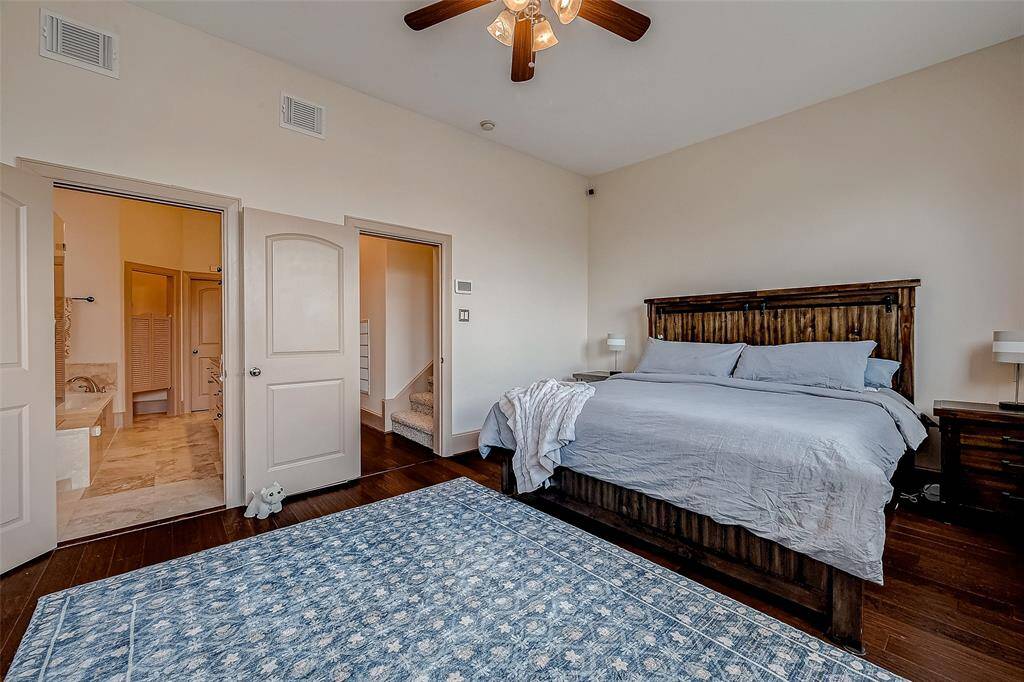 The primary bedroom flows effortlessly into the primary suite, creating a spacious and relaxing retreat.