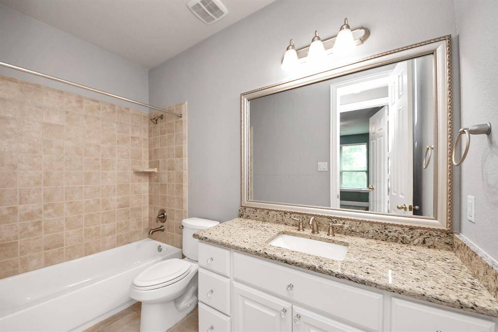 Full bath adjacent to 1st floor secondary bedroom