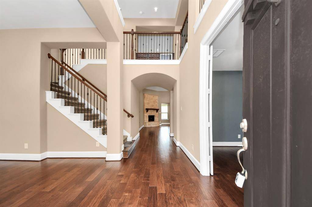 Formal dining on the left, home office on the right