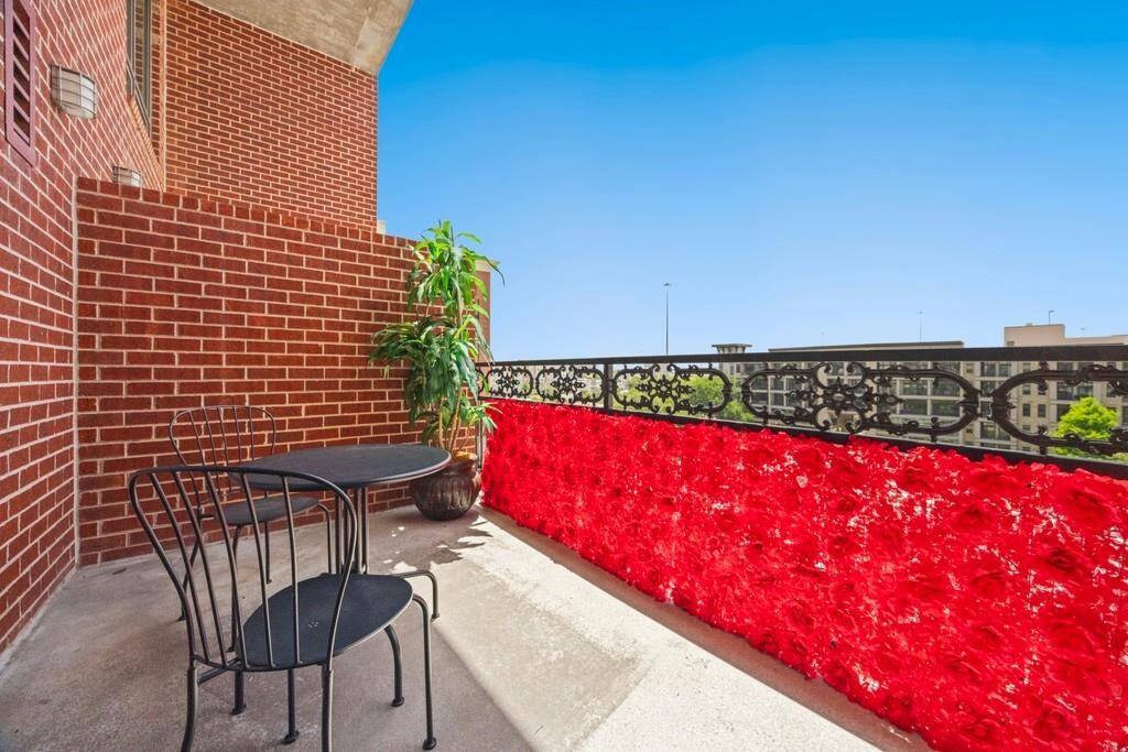 Private patio overlooks the pool and the duck pond