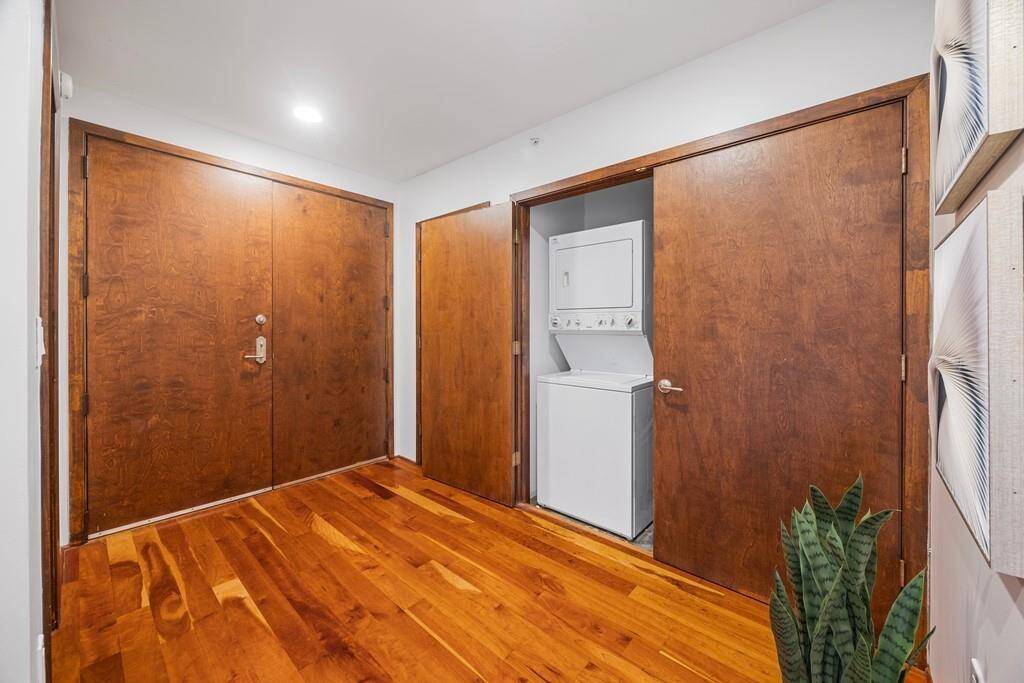 In a closet off the entry hall you will see the stackable washer/dryer.