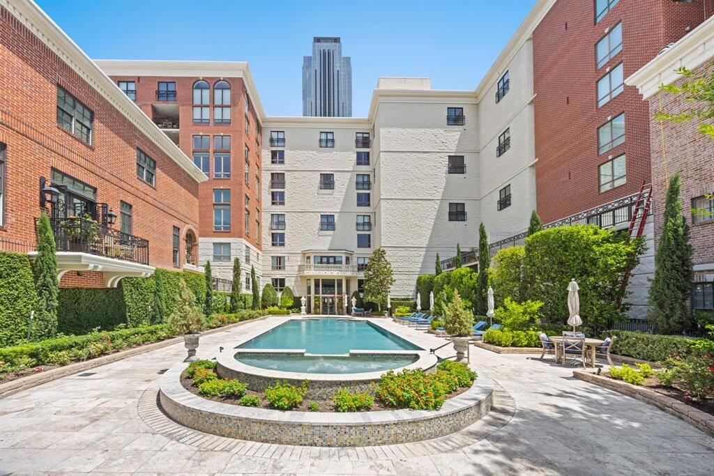 The sparkling pool area is like a resort. There is a BBQ grill for residents to enjoy as well.
