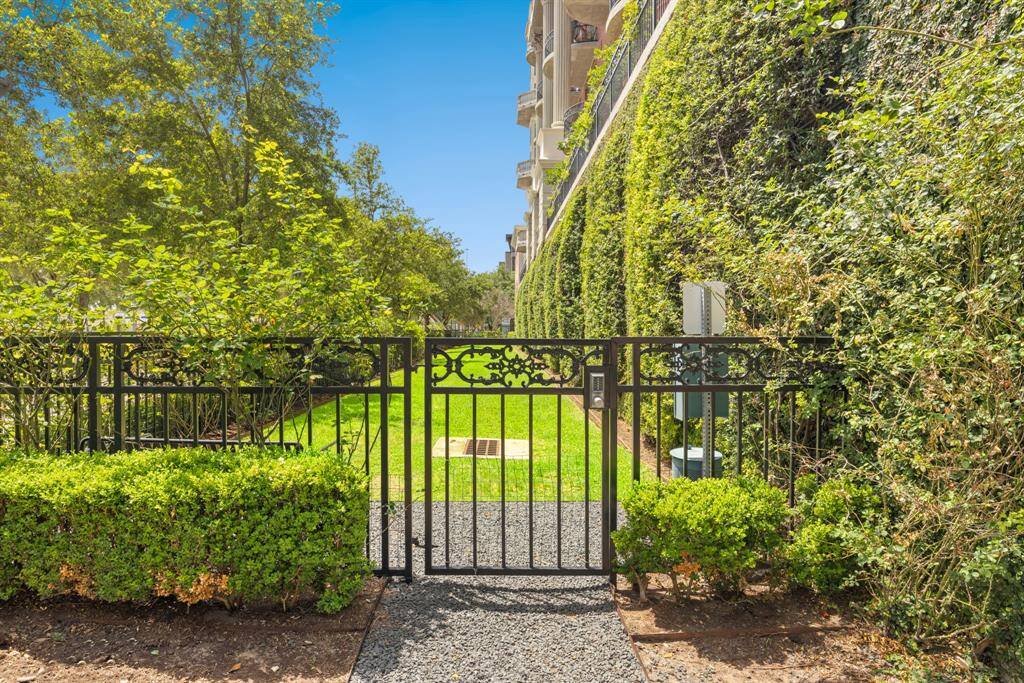 The building has a privately gated dog run for your furry friends. It is lined with gorgeous rose bushes.