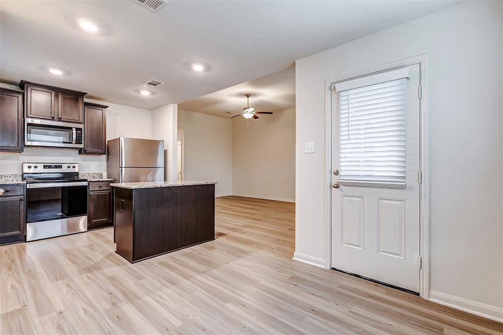 Breakfast area conveniently located adjacent to kitchen.