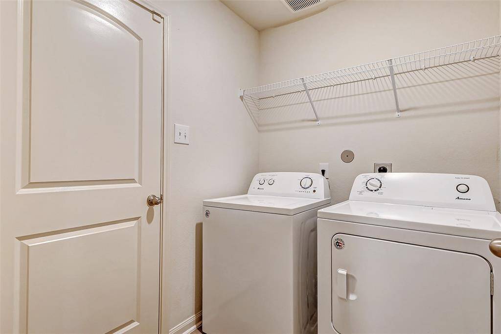 Washer and dryer included for your convenience. Door leads into the garage.
