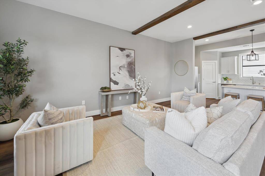 This wide, open wall is ready for your personal touch—perfect for oversized art, a statement media center, or custom shelving to showcase your favorite pieces.