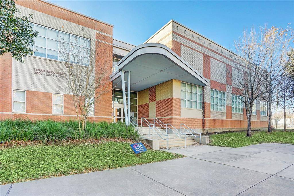 Zoned to Travis Elementary—an acclaimed neighborhood school known for academic excellence and community spirit.