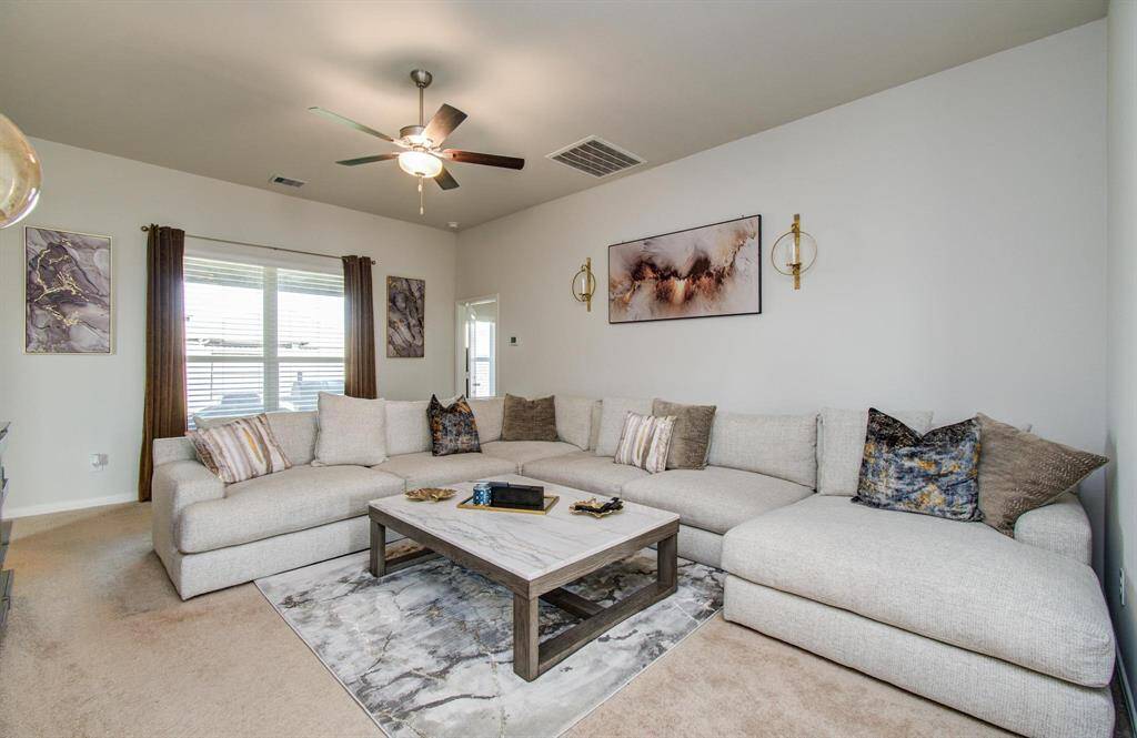 Looking for a living room that can fit a huge sectional?  You’ve found it!