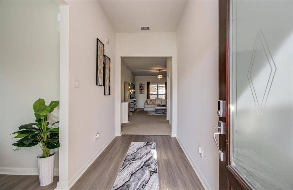 Step into an inviting foyer that sets the tone for this welcoming home.