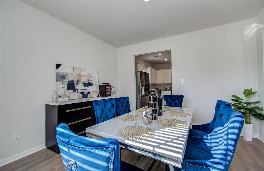 The dining room seamlessly connects to the kitchen for effortless entertaining.