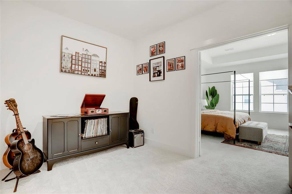 At the top of the stairs to the second floor is a spacious landing, currently used as a music nook.