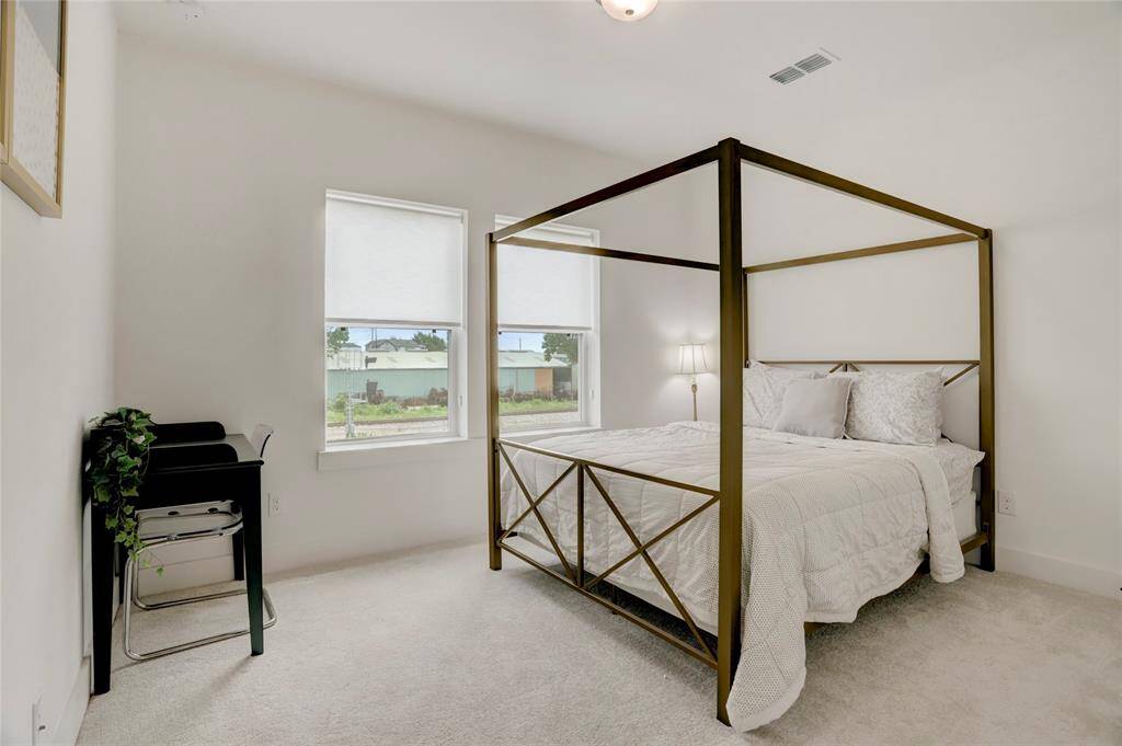 The first of two secondary bedrooms on the second floor.