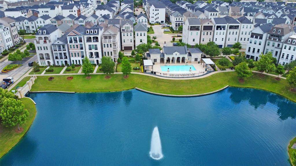 Another aerial shot of the community lake and pool area.