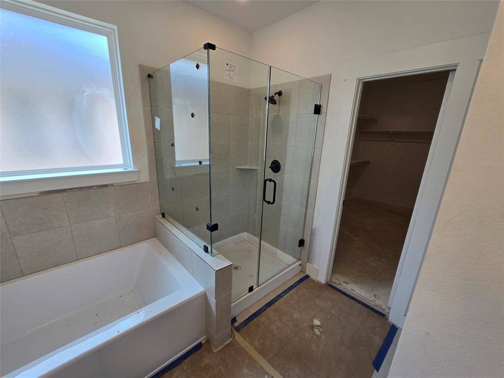 Enjoy the privacy of a well-appointed primary bath in your suite