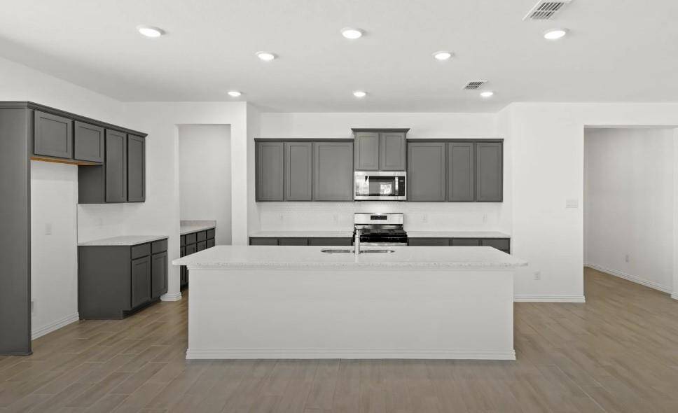 This kitchen isn’t just a place to cook; it’s a space where memories are made, where family traditions thrive, and where you can feel truly at home.