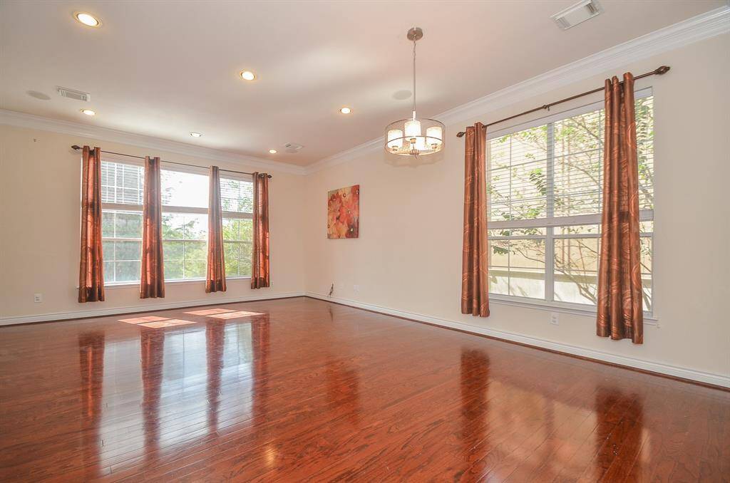 Soaring Ceilings and Natural light pouring in add to the drama of this beautiful home.