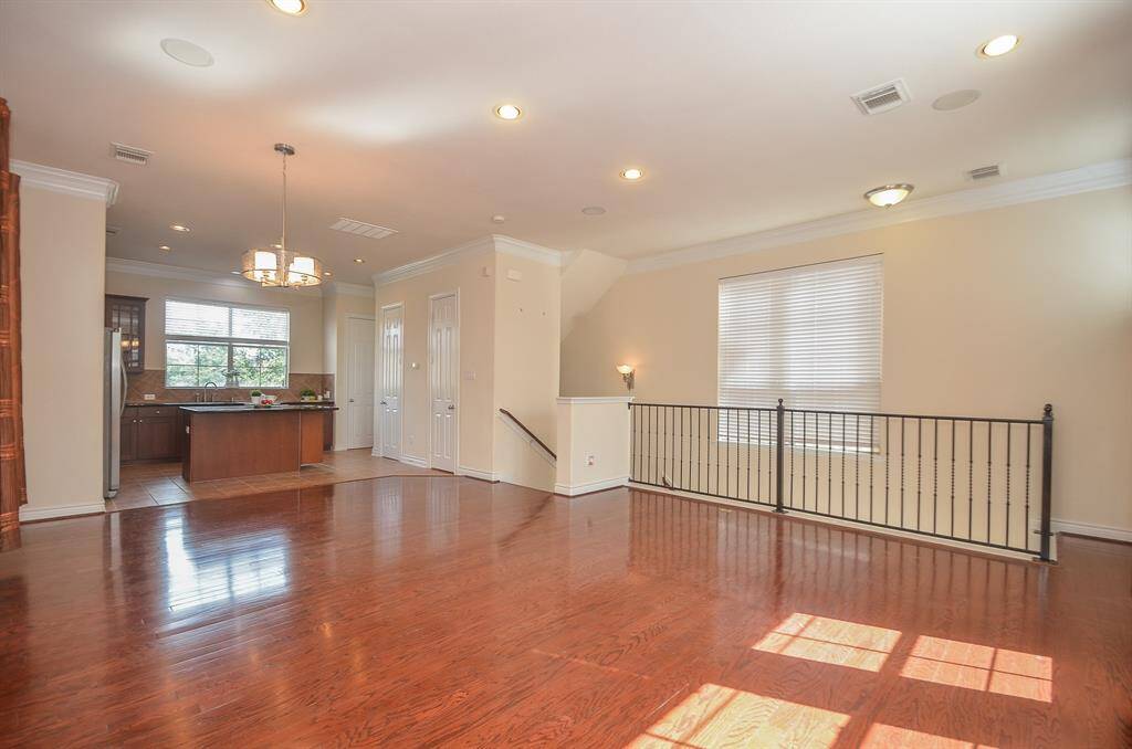 Handsome Hardwoods adorn the Spacious living area.