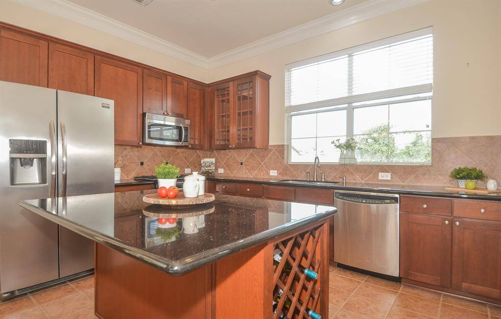 Stunning Stainless and Gorgeous Granite!