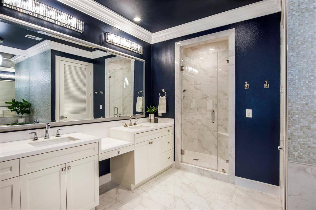 The primary en-suite is like walking into your personal spa! Large walk in shower, double sinks with plenty of storage!