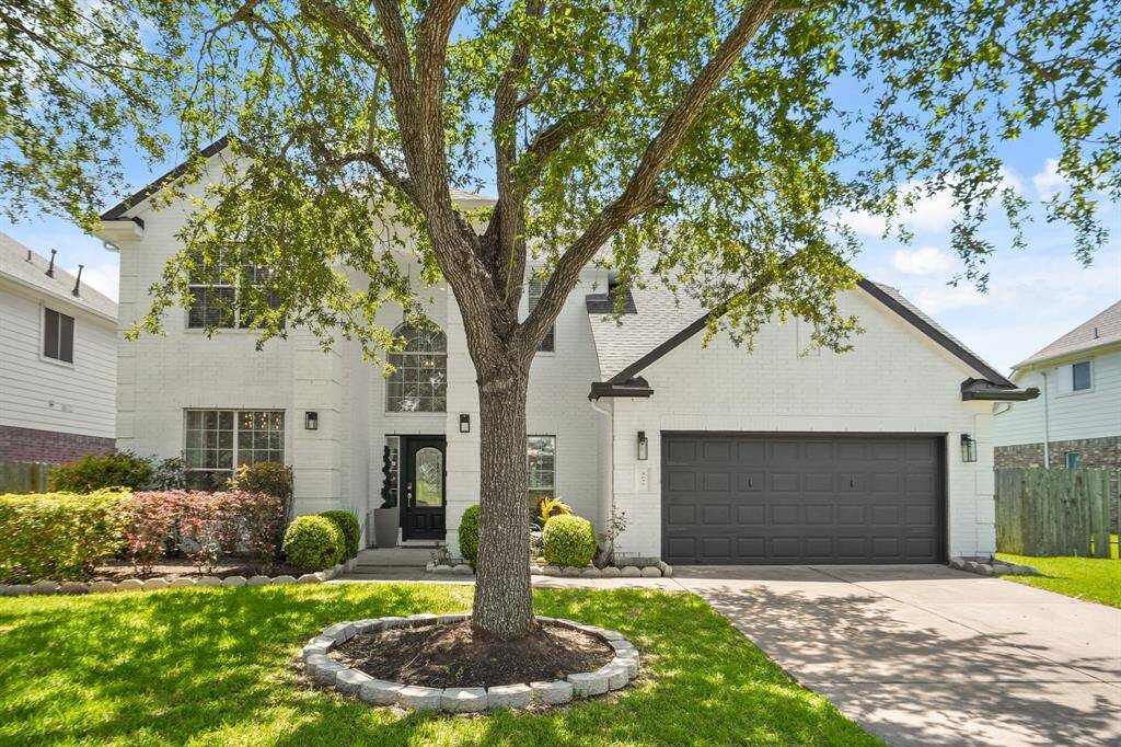 Inviting and charming, this home boasts outstanding curb appeal.