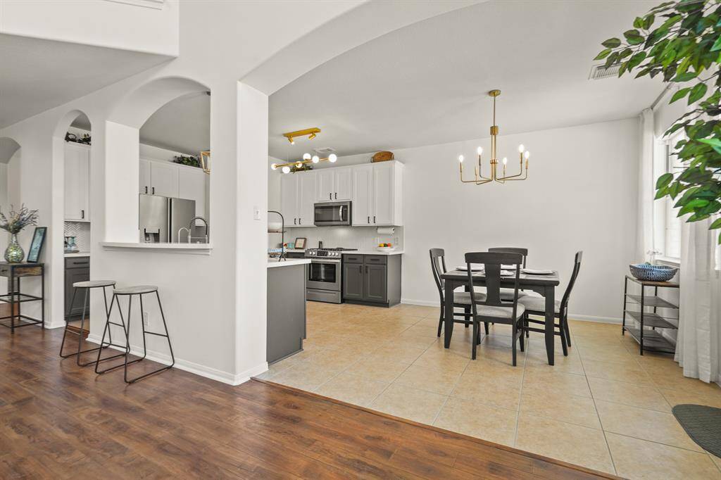 Spacious breakfast area perfect for a formal dining setup.