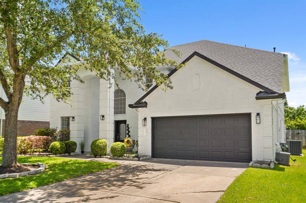 Spacious two-car garage for convenient parking and extra storage.