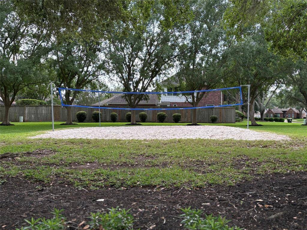 Enjoy active living with a scenic community volleyball court, perfect for friendly matches and outdoor fun.