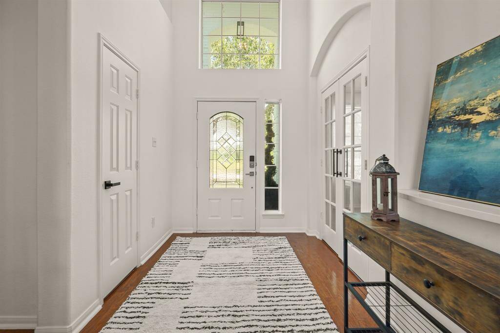 Spacious and inviting foyer with elegant design.