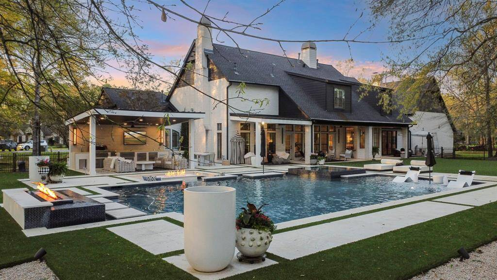 Welcome to this completely remodeled home. Finished in the most spectacular impeccable modern luxury. Double oversized bay garage also has 2 additional outdoor parking spaces.