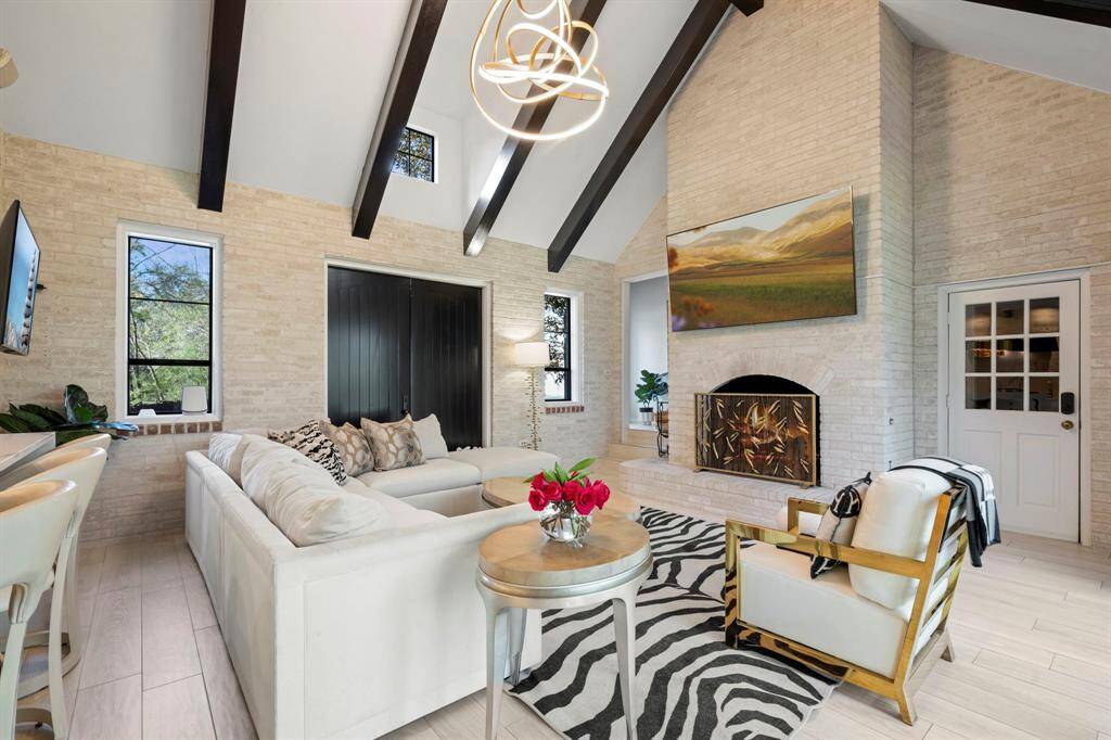 The great room.The true star of the Great room is the Global Views Convolution Chandelier from AshleyChilders. Truly stunning.