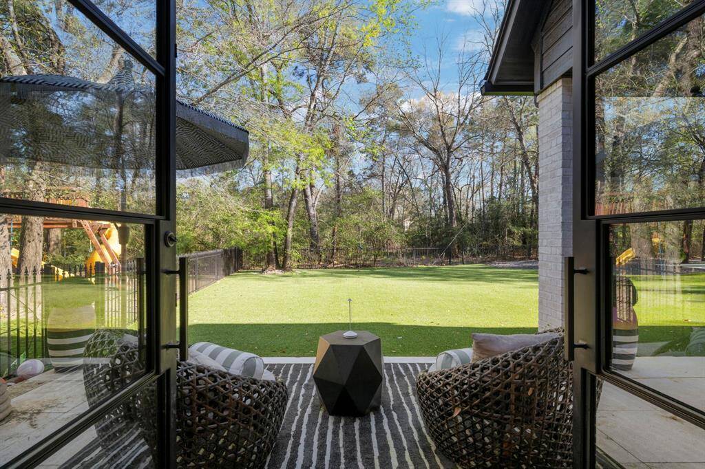 Step out to the beautiful turfed backyard.