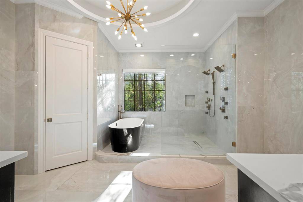 Soak and relax in this oversized tub. Automatic shade for privacy