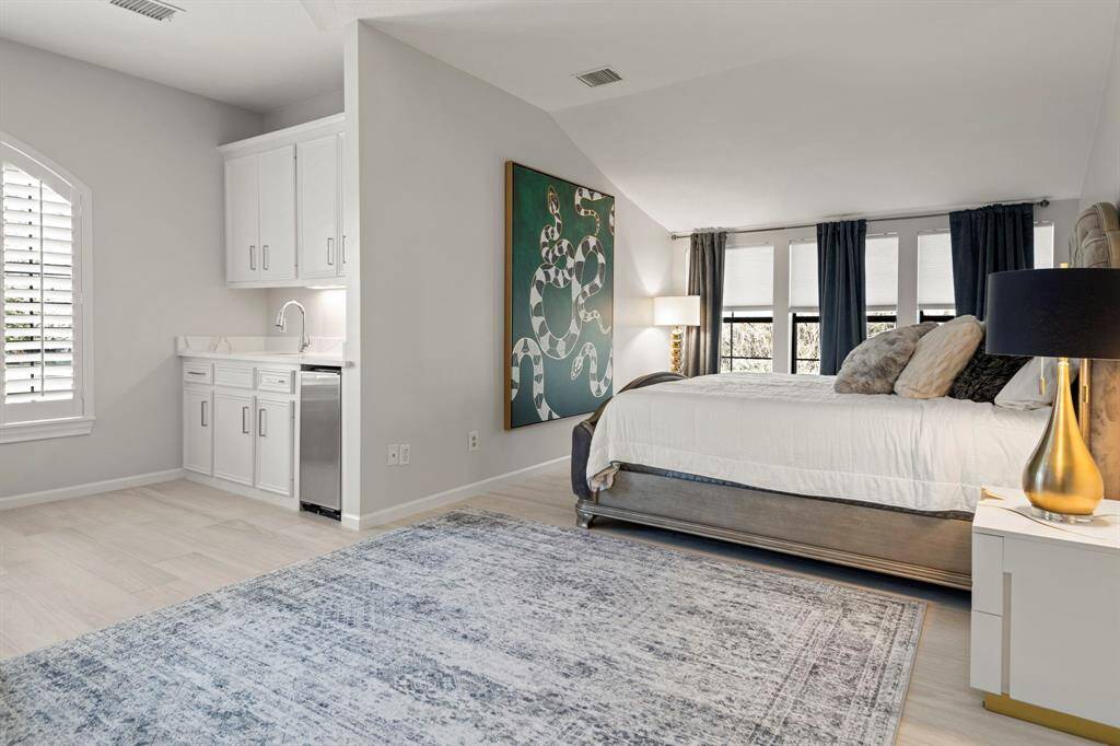 Bedroom #4 is expansive with kitchenette and sitting area