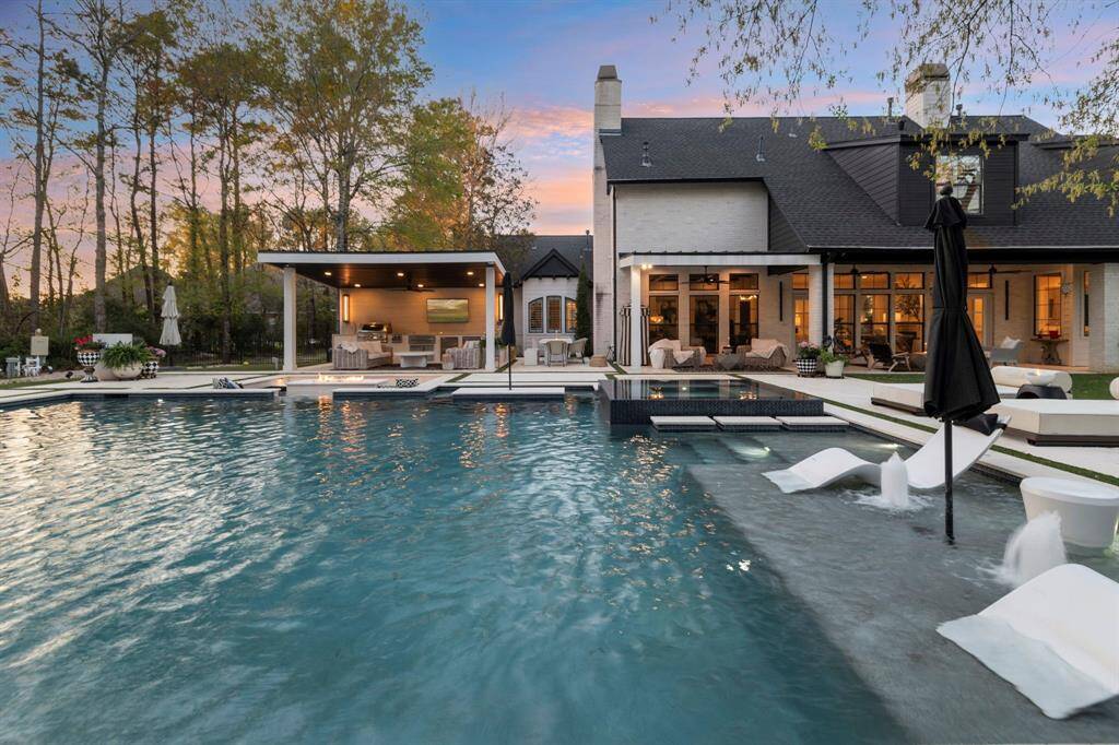 Sonos surround system, full perimeter mosquito system along with the extensive covered seating area and sunken fire pit allow for every outdoor entertaining a breeze