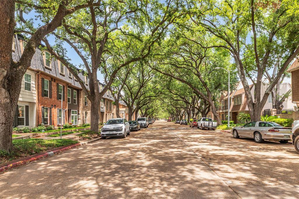Picturesque tree-canopied street offering shade, character, and charm. Ample street parking, wide walkways, and an unbeatable location minutes from the Galleria, Uptown, and Memorial Park.