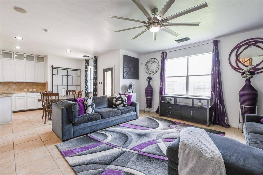 Cool walls, carpeted floor and space galore fill this incredible primary suite.