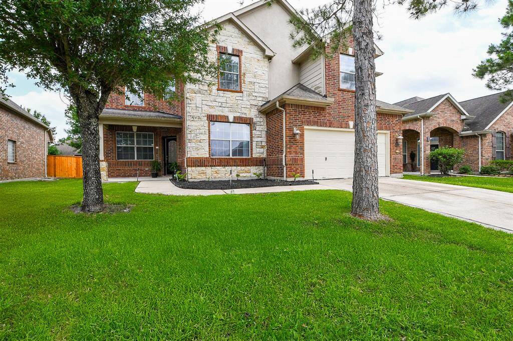 If you love the windows from here, wait until you see them on the inside. So, just roll right into the roomy driveway and dual vehicle attached garage.