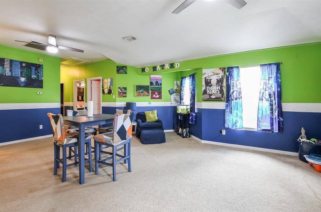 Sizeable pieces are welcomed in this secondary bedroom.