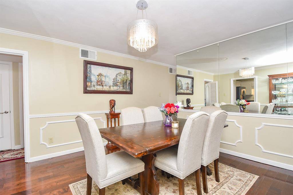 The Mirrored wall in the Dining Room is a great accent!
