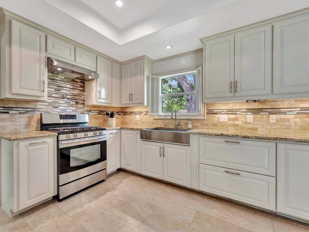Kitchen overlooks side yard