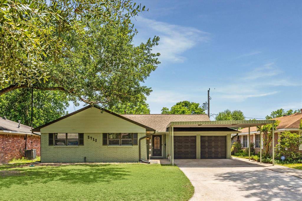5711 Nina Lee Lane Kitchen View! Come see this beautiful fully renovated 4-bedroom 3 full bath 2 car attached garage single family home on a 7200 square foot lot. MOVE IN CONDITION.