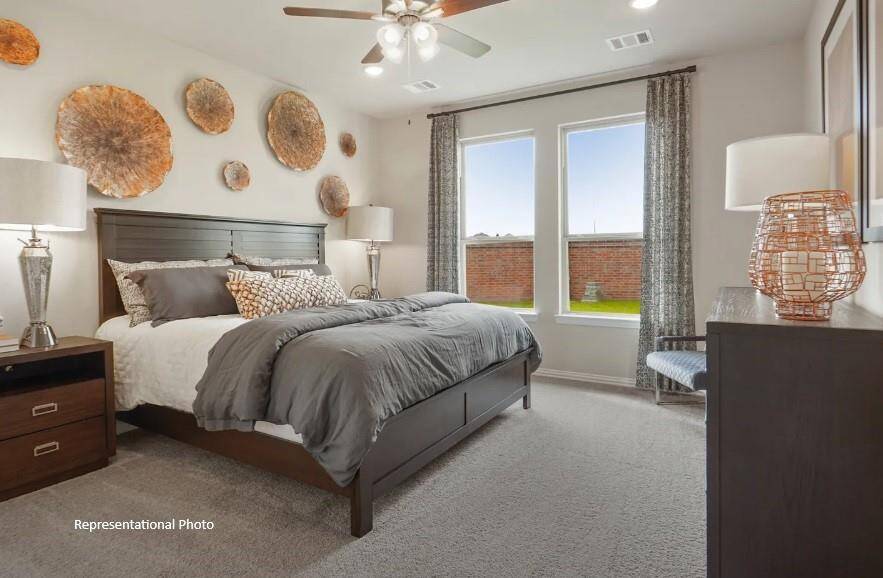 The spacious layout offers plenty of room for a plush king-sized bed, adorned with fluffy pillows and your favorite throws, inviting you to sink in and relax.