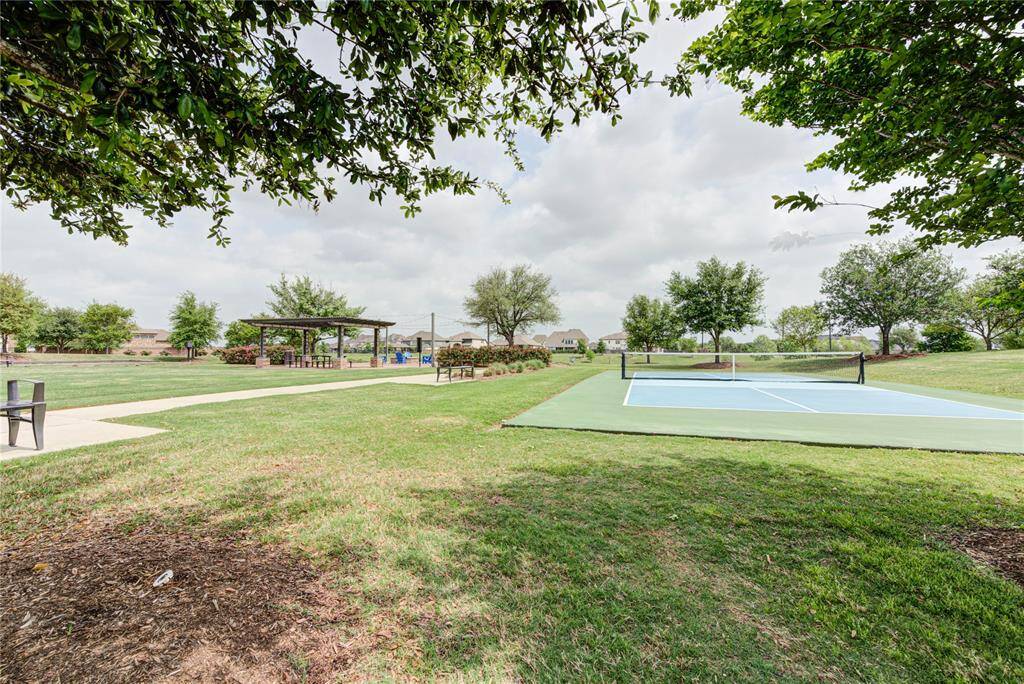 Short walk to Fireside Park that offers a grassy lawn with lots of benches, a shade pavilion, and a firepit complete with scenic lighting