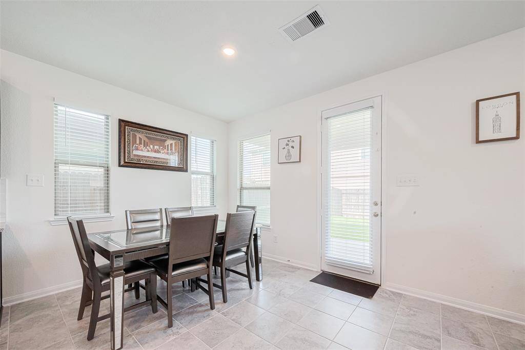 Surrounded by Windows this dining area can easily handle a table of any size for either everyday meals or Spectacular Dinner Parties.