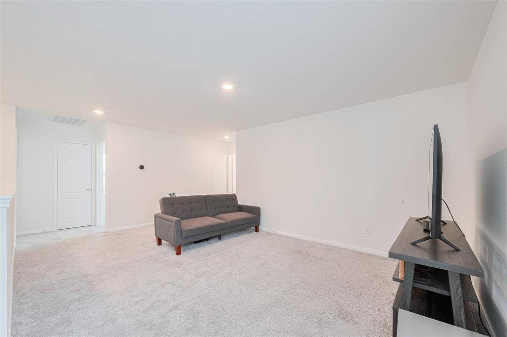 This Game Room is only limited by your imagination whether it's a hangout space for the kids or a pool table this room can easily accommodate it all.