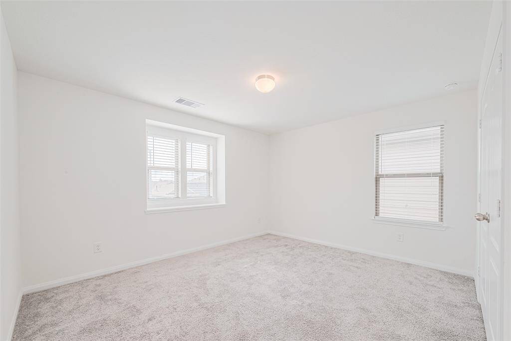 This generously sized 13' X 12' Bedroom offers Two Big Windows with one them slightly recessed for a clean modern look.