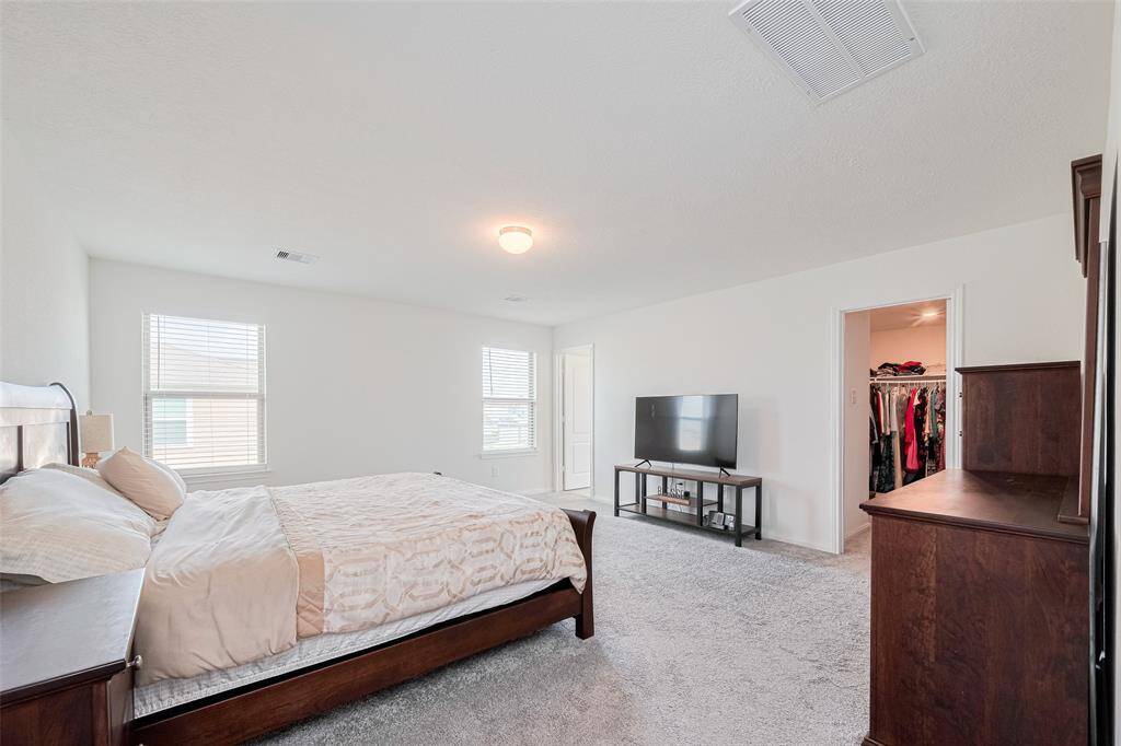 Now we enter the large Light Filled Owners Suite with a Spacious 10' X 8' Walk-In closet.