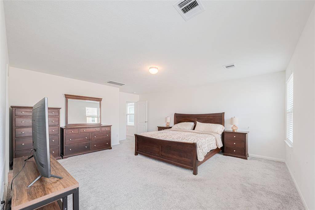 Just Look how large this room is, it can Easily Handle Large Furniture Pieces and there is room for a sitting area.