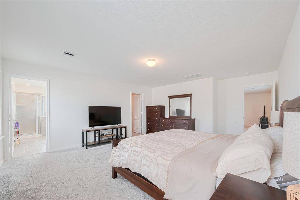 Is is another view of this Grand Space that is perfect for the King & Queen of the household!